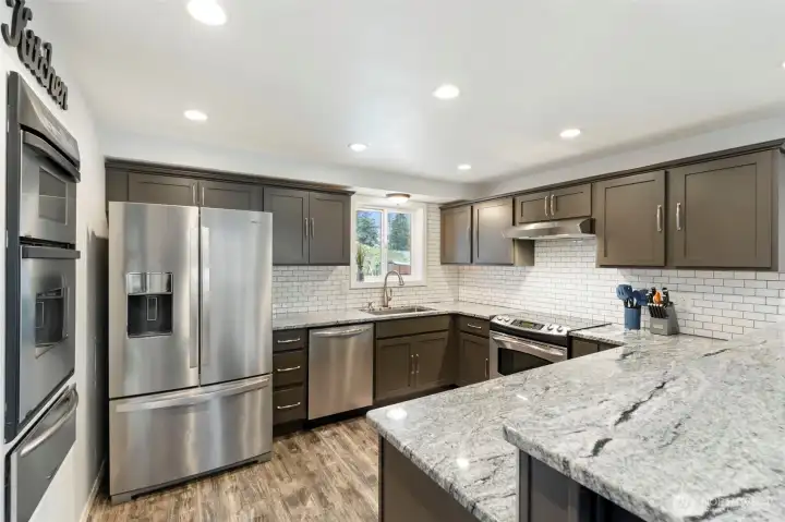Remodeled kitchen with granite counters