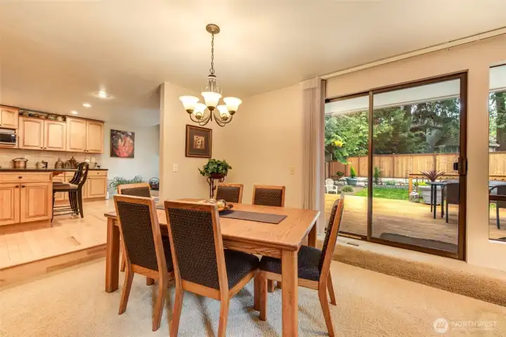 The living room flows seamlessly into the dining room