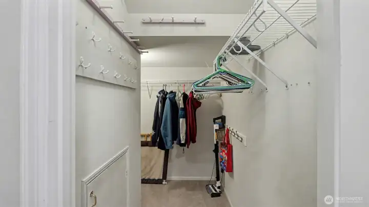 Lighted closet with ample room for storage
