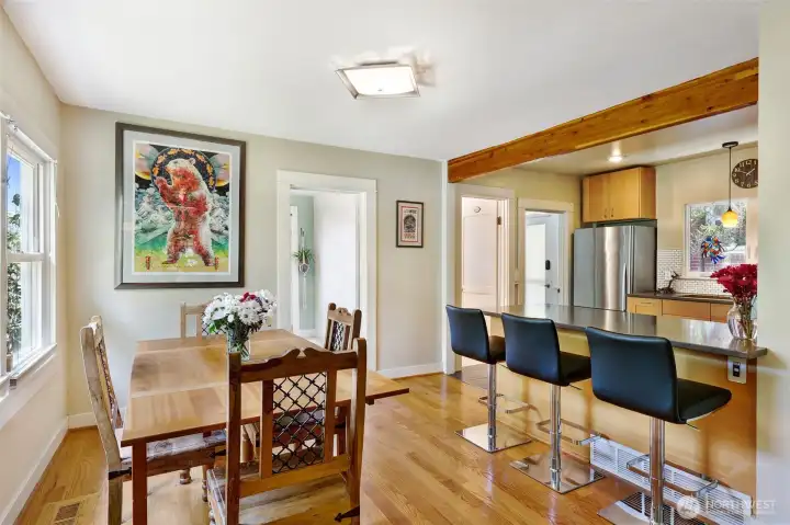 Dining room with full view of adjoining spacious kitchen.