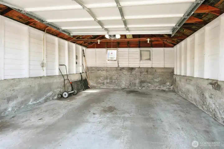 Oversized one car garage for parking and storage. Can fit a full size car like a Camry, with lots of room on both sides to get in and out.