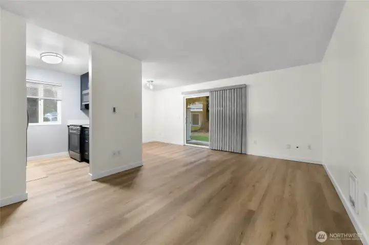 Updated & open living space in this move-in ready Kirkland condo features all new flooring, light fixtures, paint, & trim.