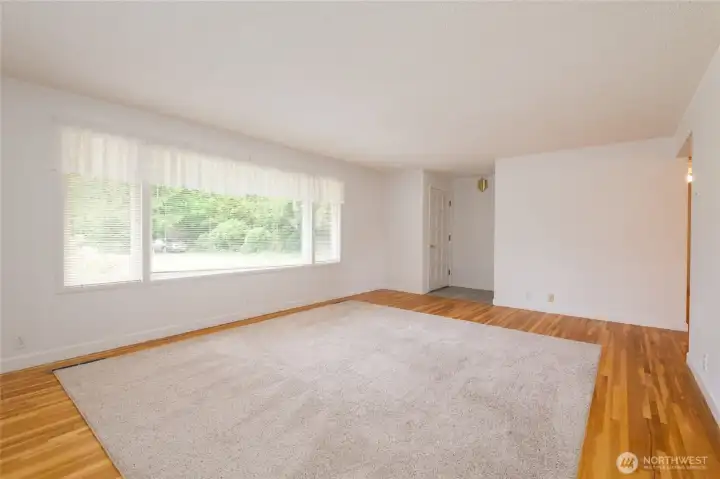 Light and airy Living room with hardwood floors