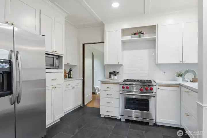 The dining room connects easily with the chef's kitchen, making it easy to host smooth and seamless dinner parties.
