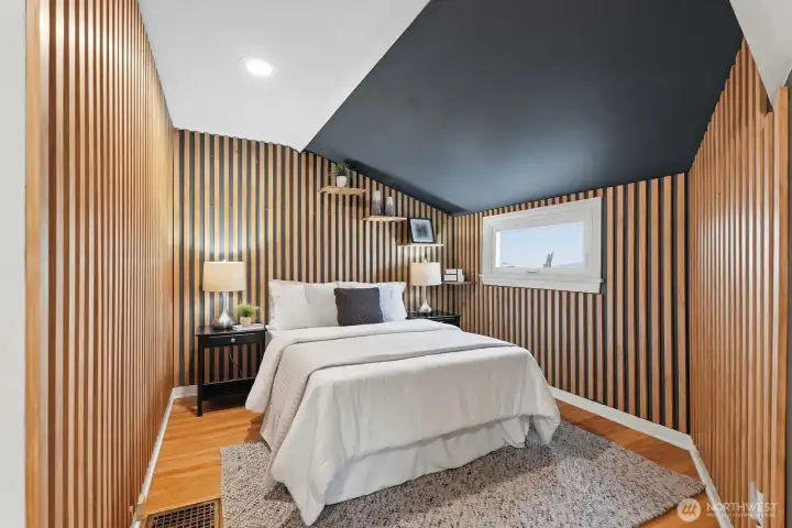 Head upstairs to check out two additional bedrooms, including this unique, comfortable space!