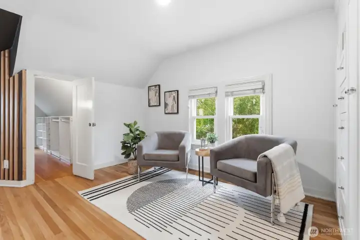 Notice even more built-in storage to the right of this bright and inviting seating area.