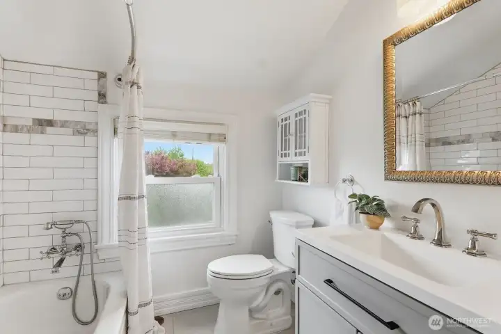 Shared full bathroom upstairs.