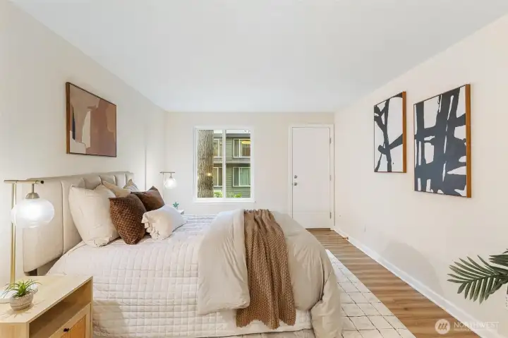 Alternate view of the secondary bedroom with large window and closet. Alternate view of the secondary bedroom with large window and closet.