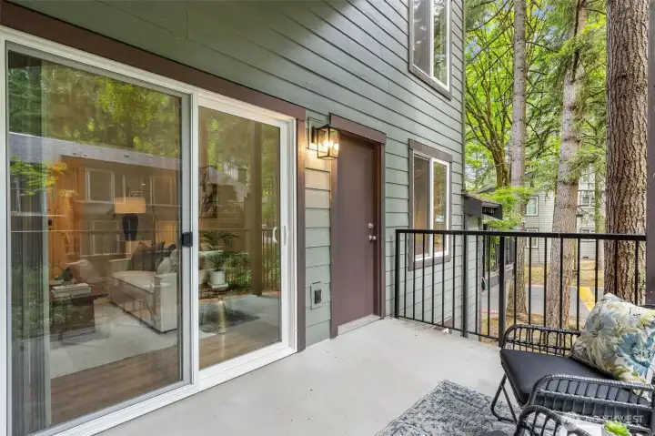 Spacious patio with sliding glass door access to the living room. Spacious patio with sliding glass door access to the living room.