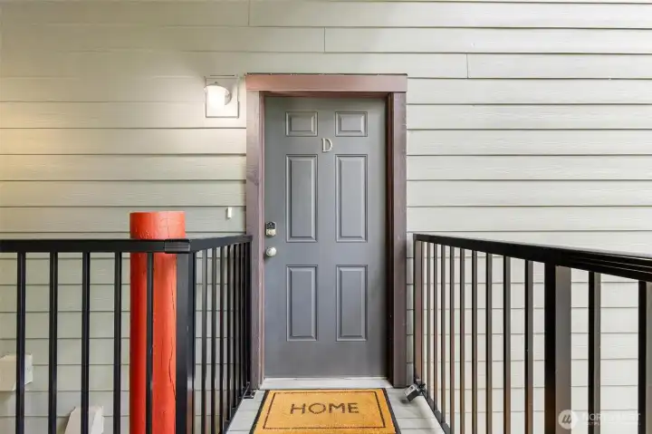 Private front entry with covered landing. Private front entry with covered landing.
