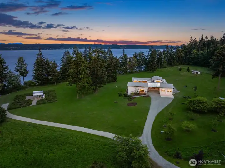 Imagine 777 feet of extraordinary waterfront embracing privacy, serenity, and sweeping sea-to-island views on 20 Acres.