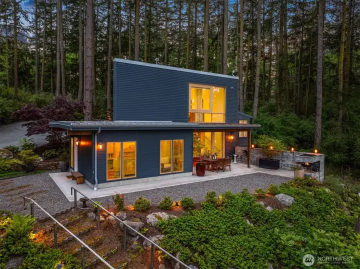 Dwell home offers 1010 sq ft of modern living with exceptional water and Mt. Baker views.