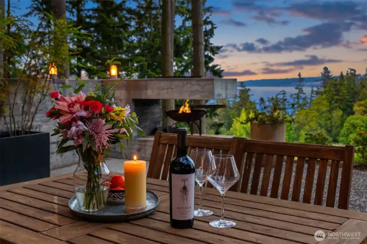 The outdoor fireplace, paired with breathtaking views, creates an unforgettable setting designed for evenings and memories that will last a lifetime.
