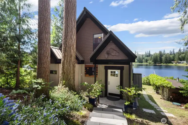 Rebuilt to last long term with Champion metal siding, stone veneer and a metal roof.