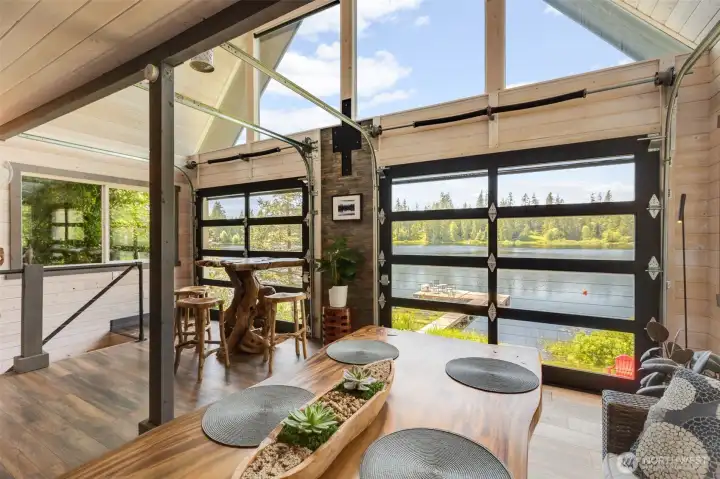 Double garage doors open to bring the outside in!