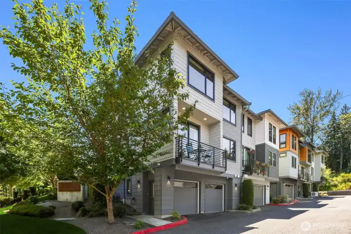 Attached 2-car garage. This home is a prime location within the community and an end unit for optimal light, and privacy Attached 2-car garage. This home is a prime location within the community and an end unit for optimal light, and privacy