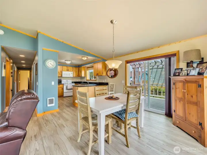 Sliding door off of dining room leads to the back deck. Sliding door off of dining room leads to the back deck.