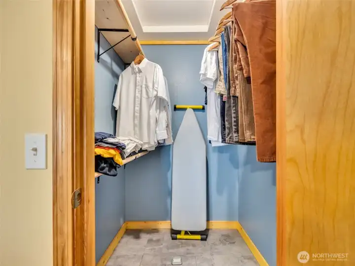 Walk-in closet off of primary bedroom. Walk-in closet off of primary bedroom.