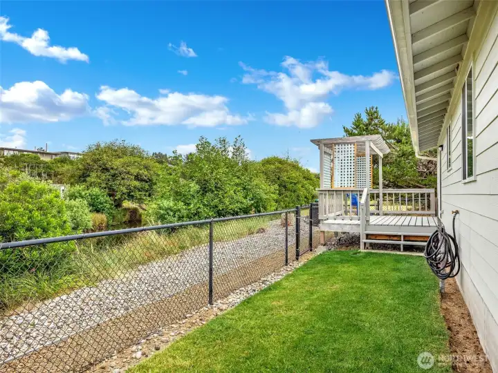 Fully fenced yard area is ideal for furry friends. Fully fenced yard area is ideal for furry friends.