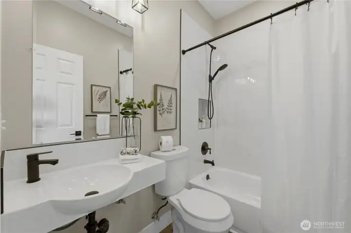 Full bath attached to main floor bedroom
