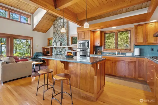 A center island with eating bar complements this kitchen.