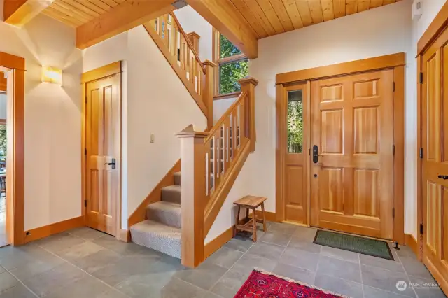 Front entry with thoughtful wood finishes that extend throughout.