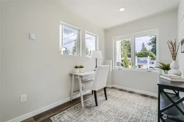 Entry level third bedroom (staged as an office).