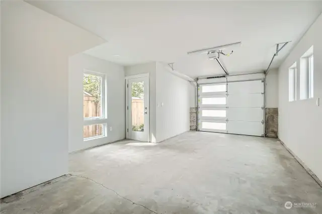 Garage with space for storage.