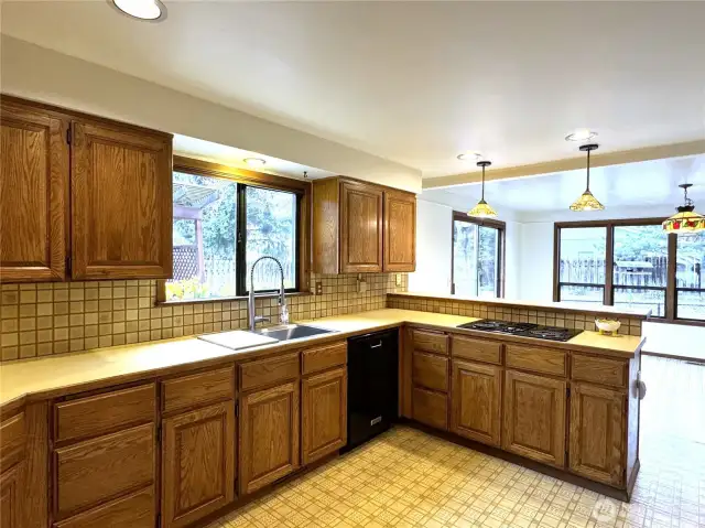 Large kitchen, tons of cabinet space and natural light!