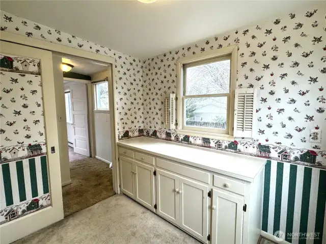 extra room upstairs, plumbing under cabinets. Future office?
