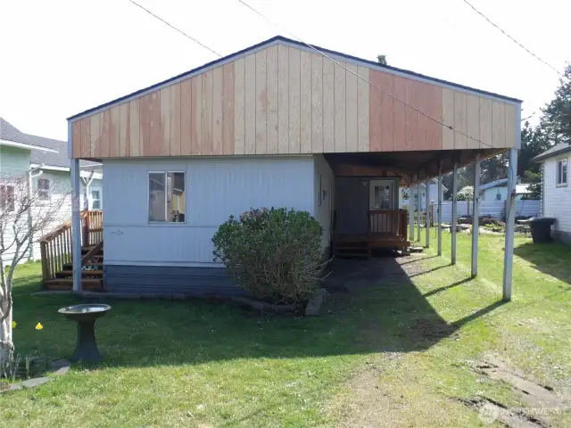 Close to the beach and practically in town, this  nicely redone singlewide is definitely worth a look.  Includes a 12 x 16 cabin on south end of property.