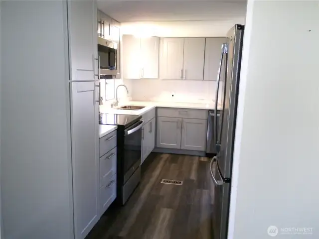Walk into kitchen from the hallway/living room.