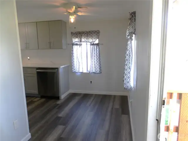 Kitchen eating space next to the buttoned up kitchen is  to the right as you walk in.