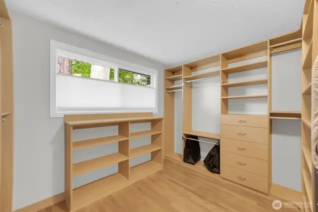 Primary bedroom walk in closet
