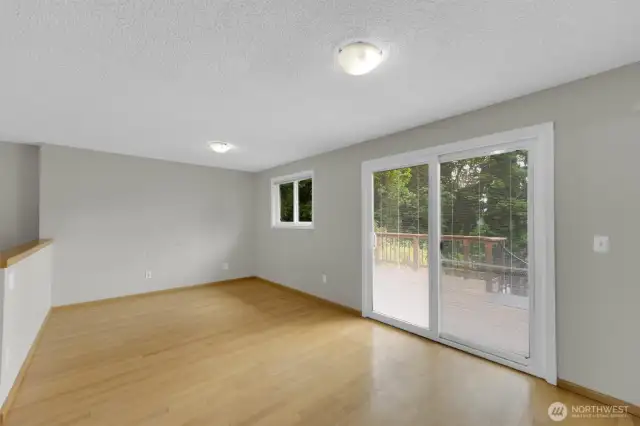 Sliding glass doors and additional space upstairs living room