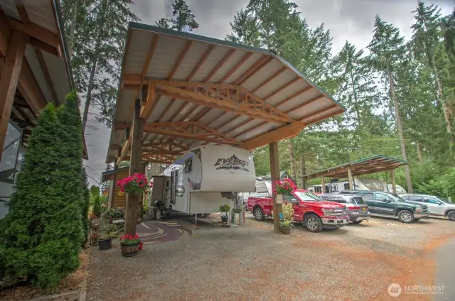 15 HEMLOCK RV SITE WITH SHED, WASHER/DRYER/UTILITY SINK, PATIO FURNITURE WITH FIRE TABLE.  120 GALLON IN GROUND PROPANE TANK.
