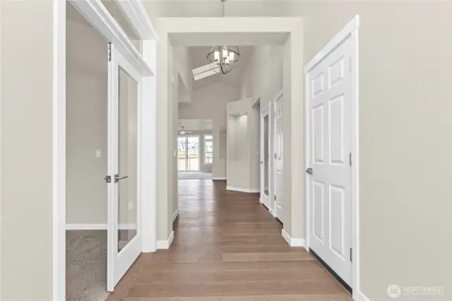 Welcome home! Step into the entry hall with hardwood flooring, contemporary details and white millwork throughout.