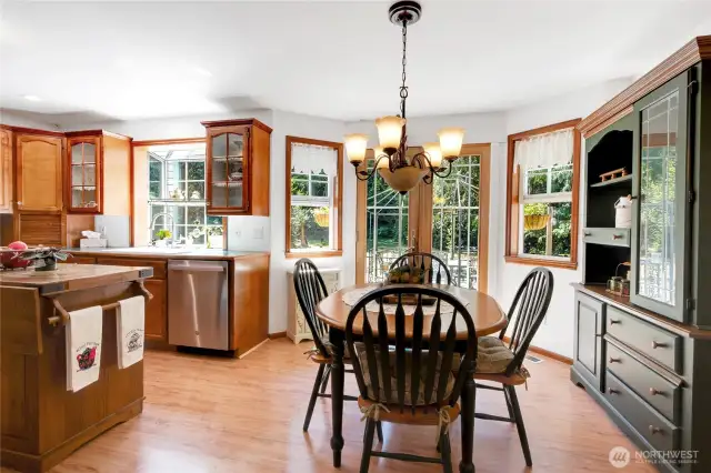 Kitchen with breakfast nook that opens with the French Doors to the very large patio with Gazebo that stays!