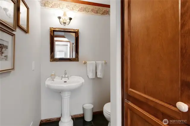 Hall half bath off Utility and office