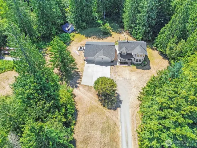 Drone Shot of the acreage and the Brand NEW ROOF!