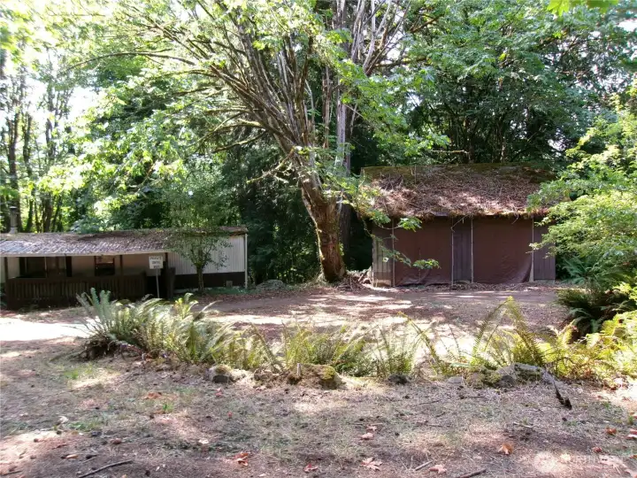 Large shop/garage. Fix it up or remove it, the choice is yours