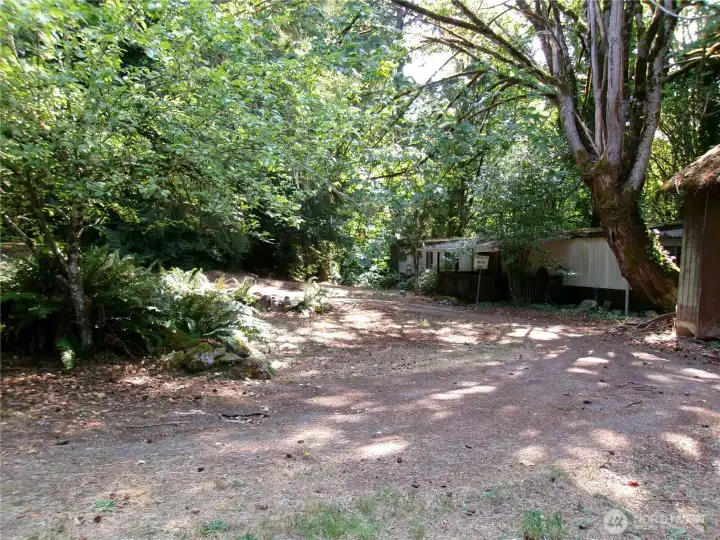 Paved turnaround driveway makes coming and going a breeze.