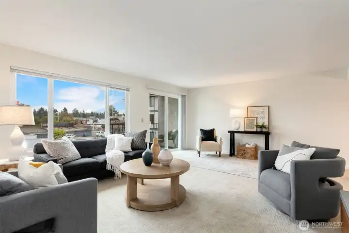 The Royal Oak Condominiums unit #208 has 2BR/1.75BA with a lot of natural light & parking!