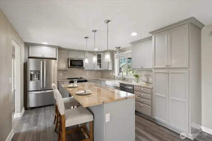 Completely remodeled kitchen with granite counters and SS appliances