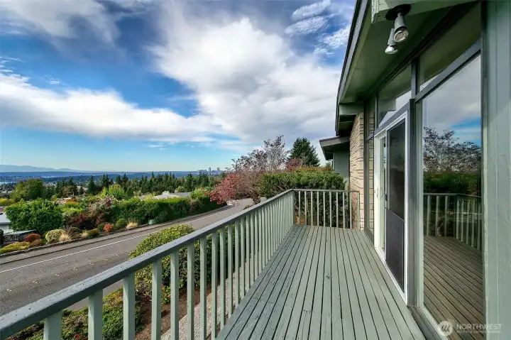 Deck off front of home wraps around side