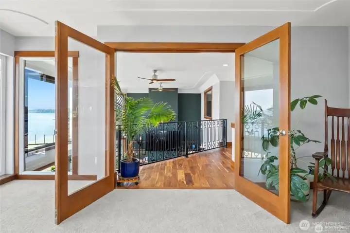 Large primary looks out to the great room