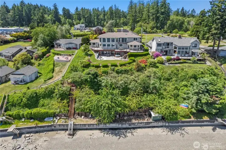 Storage shed on bulkhead for your water toys. Kayak and paddle board off your beach.