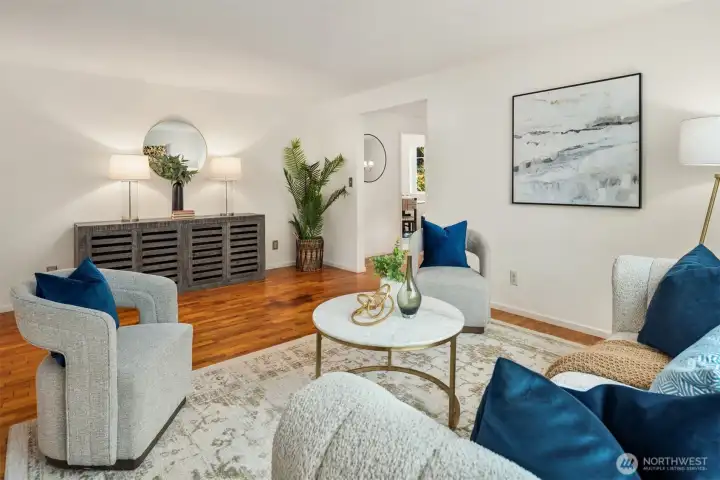 Another view of the living room with hard wood floors.