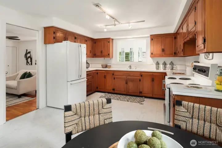 From the kitchen you can go into the family room with a wood burning fireplace.