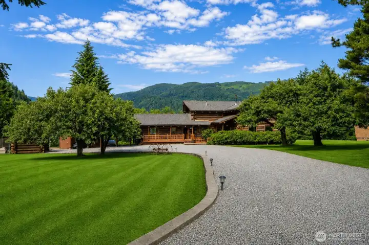2+ acres of sprawling grounds on the coveted south end of Lake Whatcom, offering privacy, towering evergreens, and an unforgettable Pacific Northwest setting.